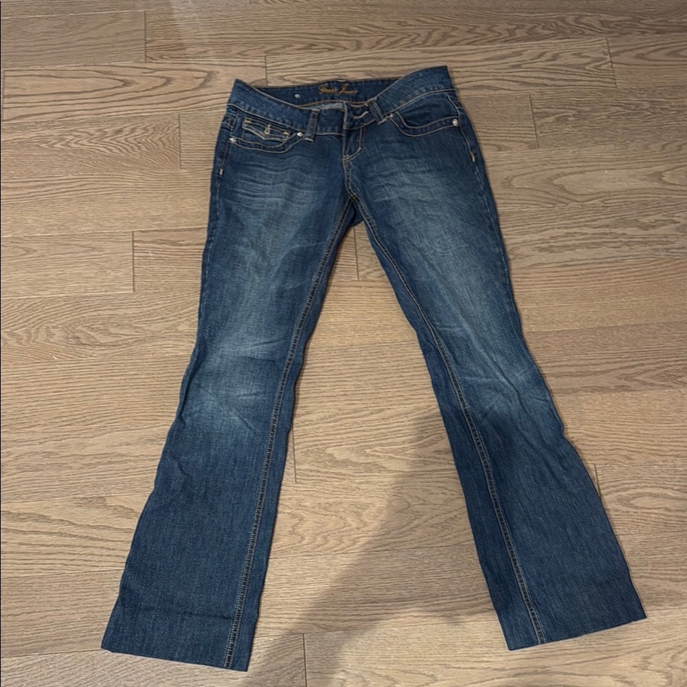 GUESS dark blue wash low rise boot cut jeans